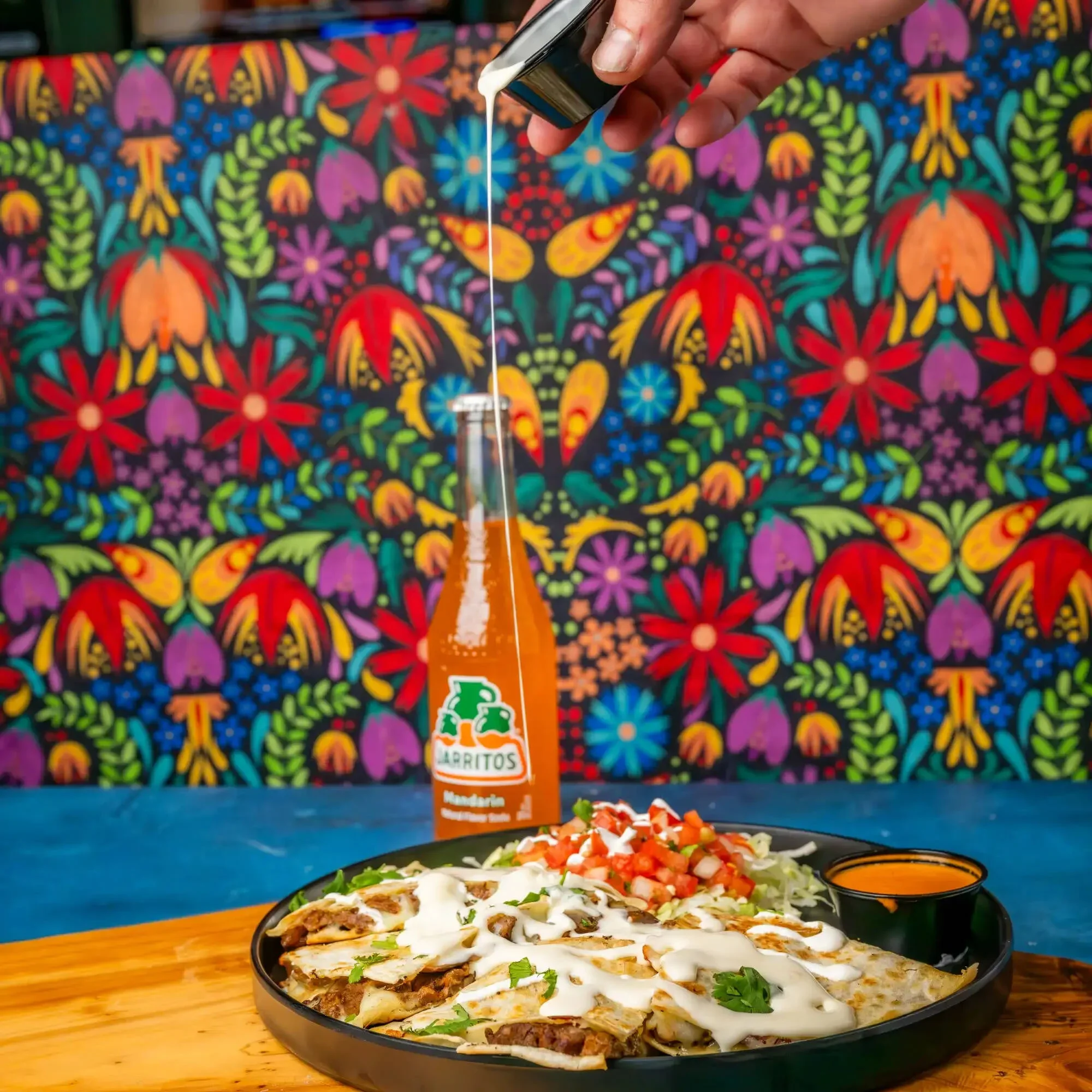 Crispy Mexican quesabirria tacos with consommé dipping sauce