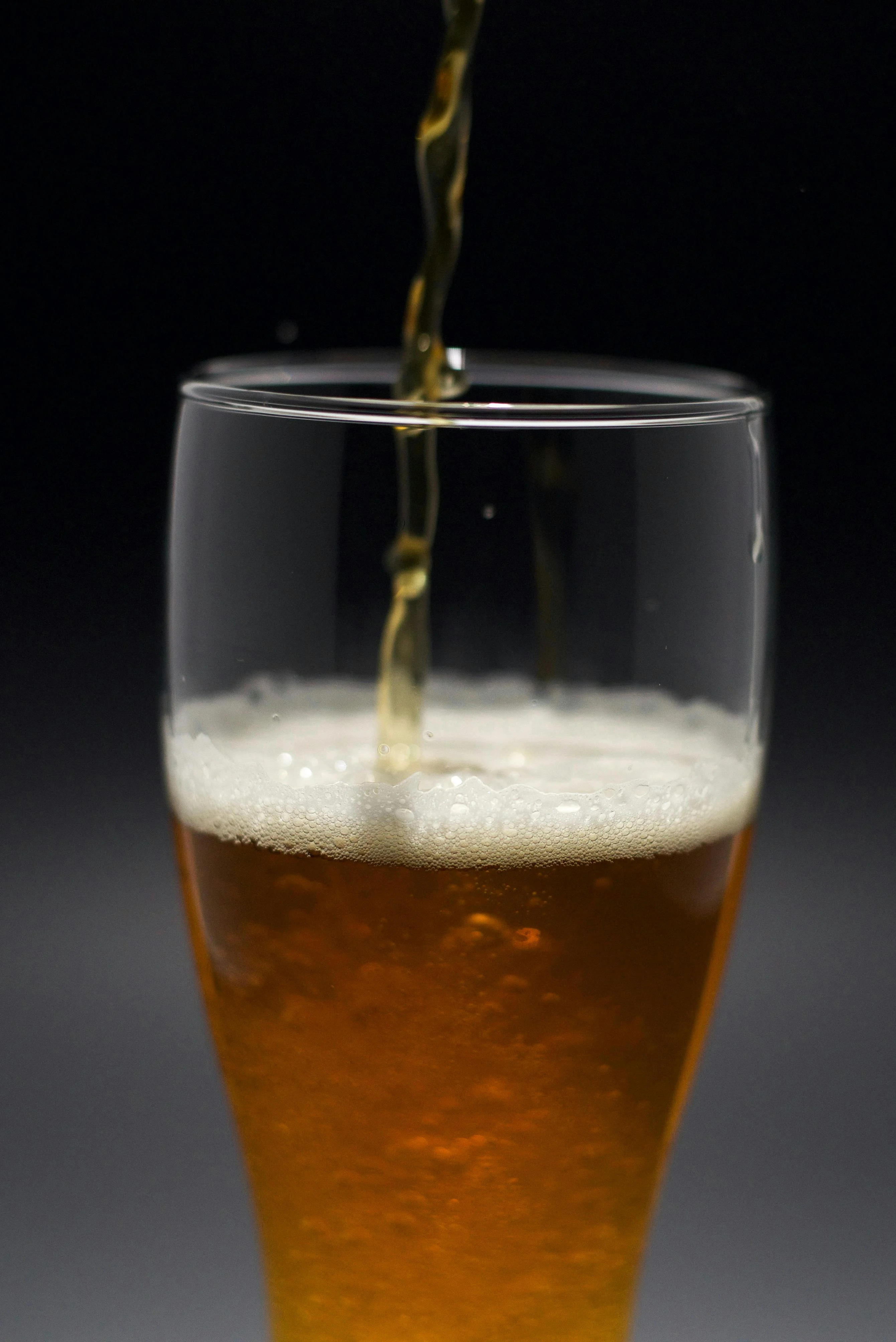 Pouring a refreshing craft beer into a glass