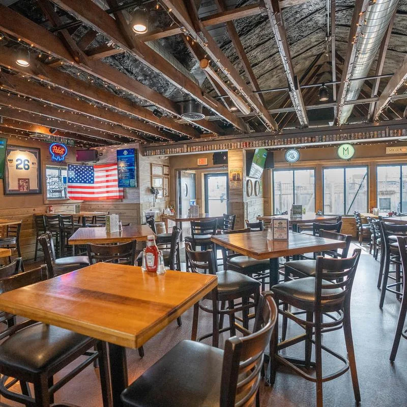 Cozy restaurant interior with wooden beams and American decor