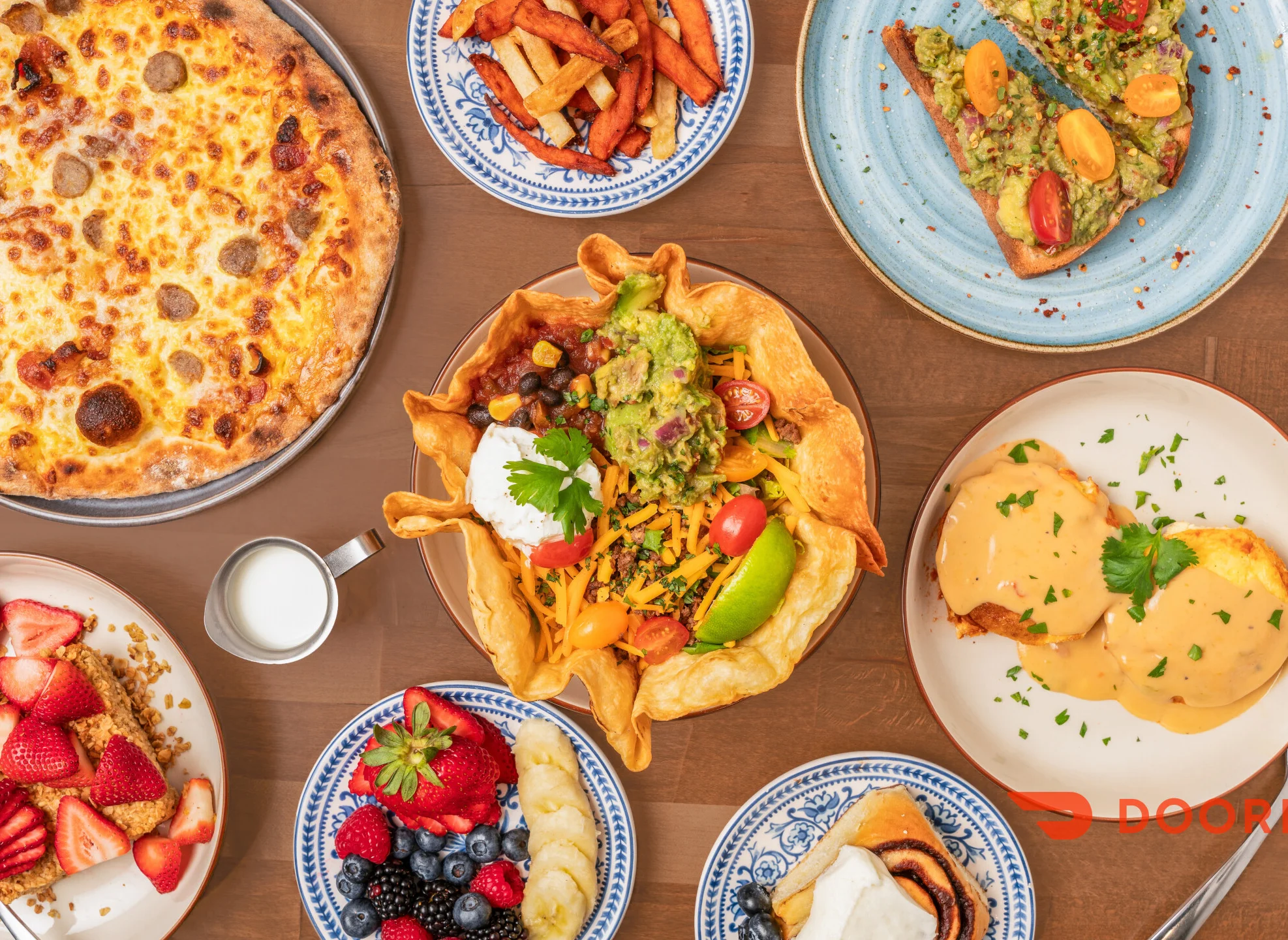 Variety of dishes including pizza, nachos, and avocado toast
