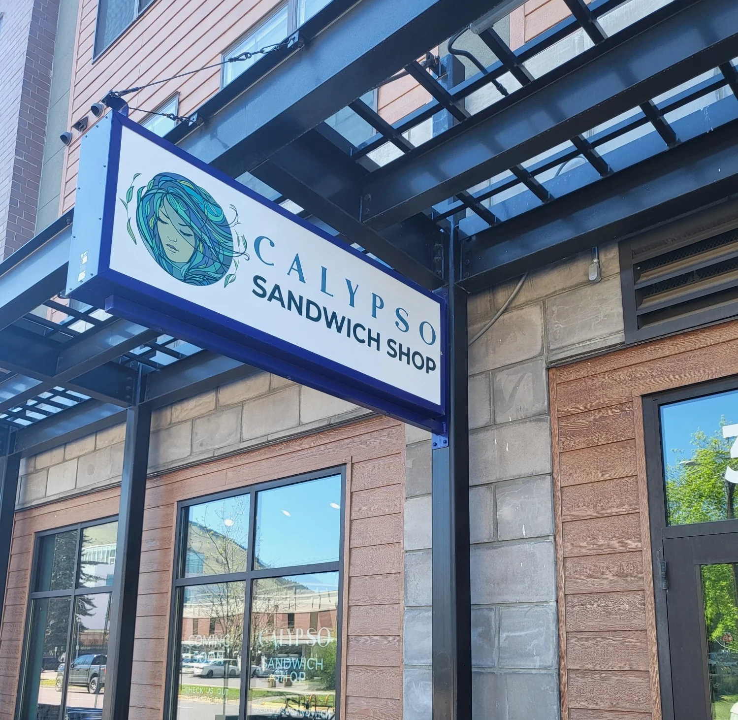 Exterior view of Calypso Sandwich Shop with outdoor seating