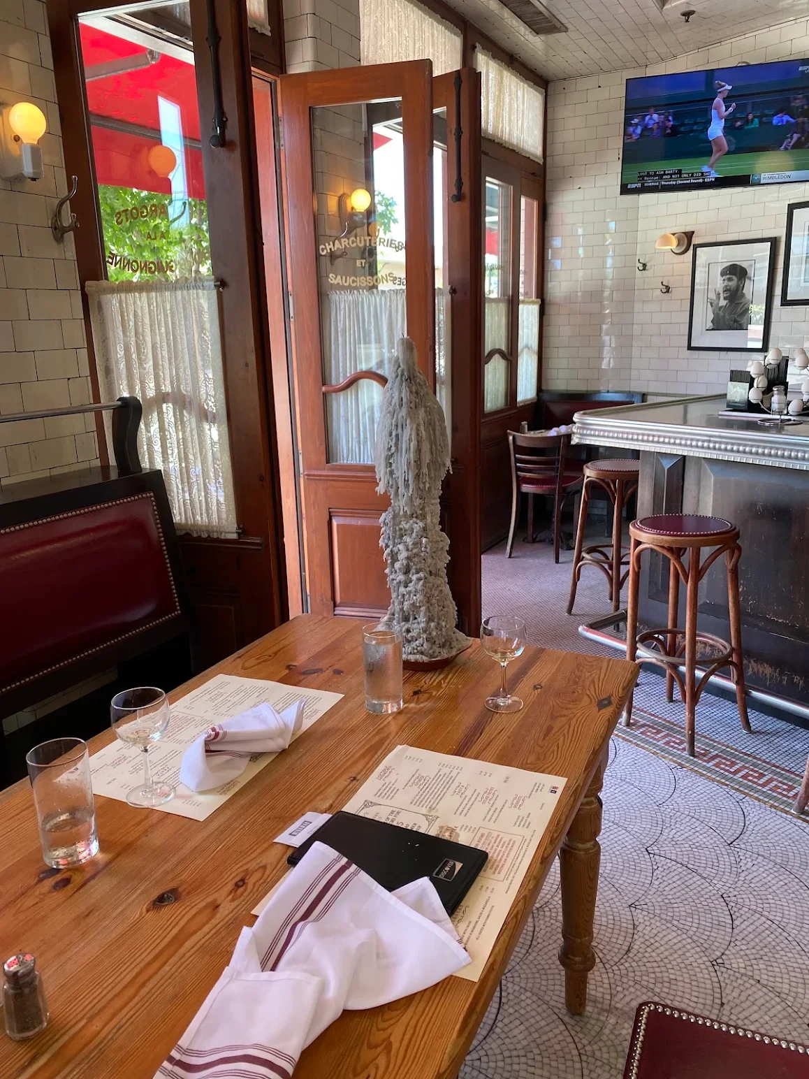 Cozy restaurant interior with wooden tables and elegant decor