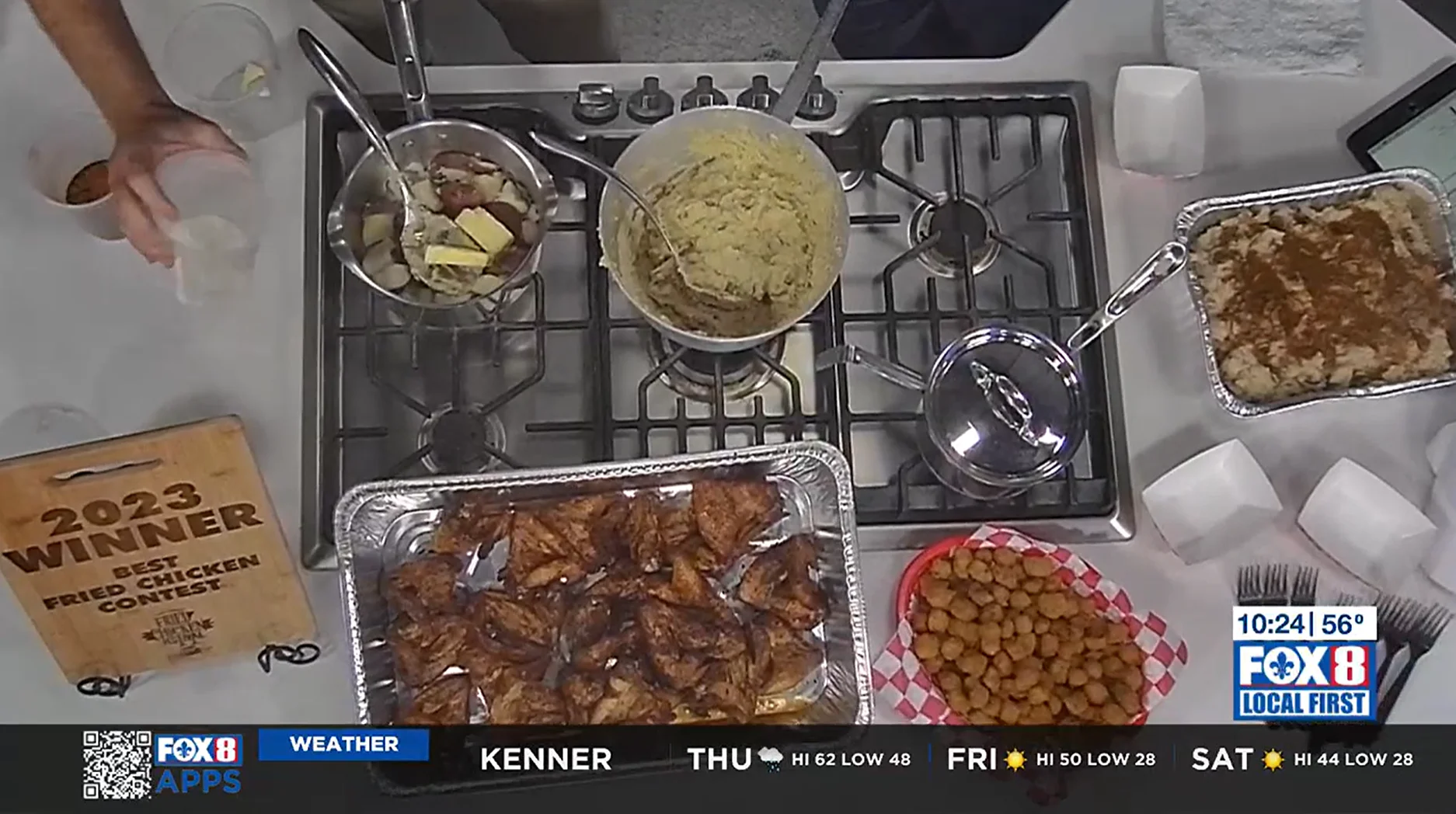 Award-winning fried chicken with sides on a kitchen counter
