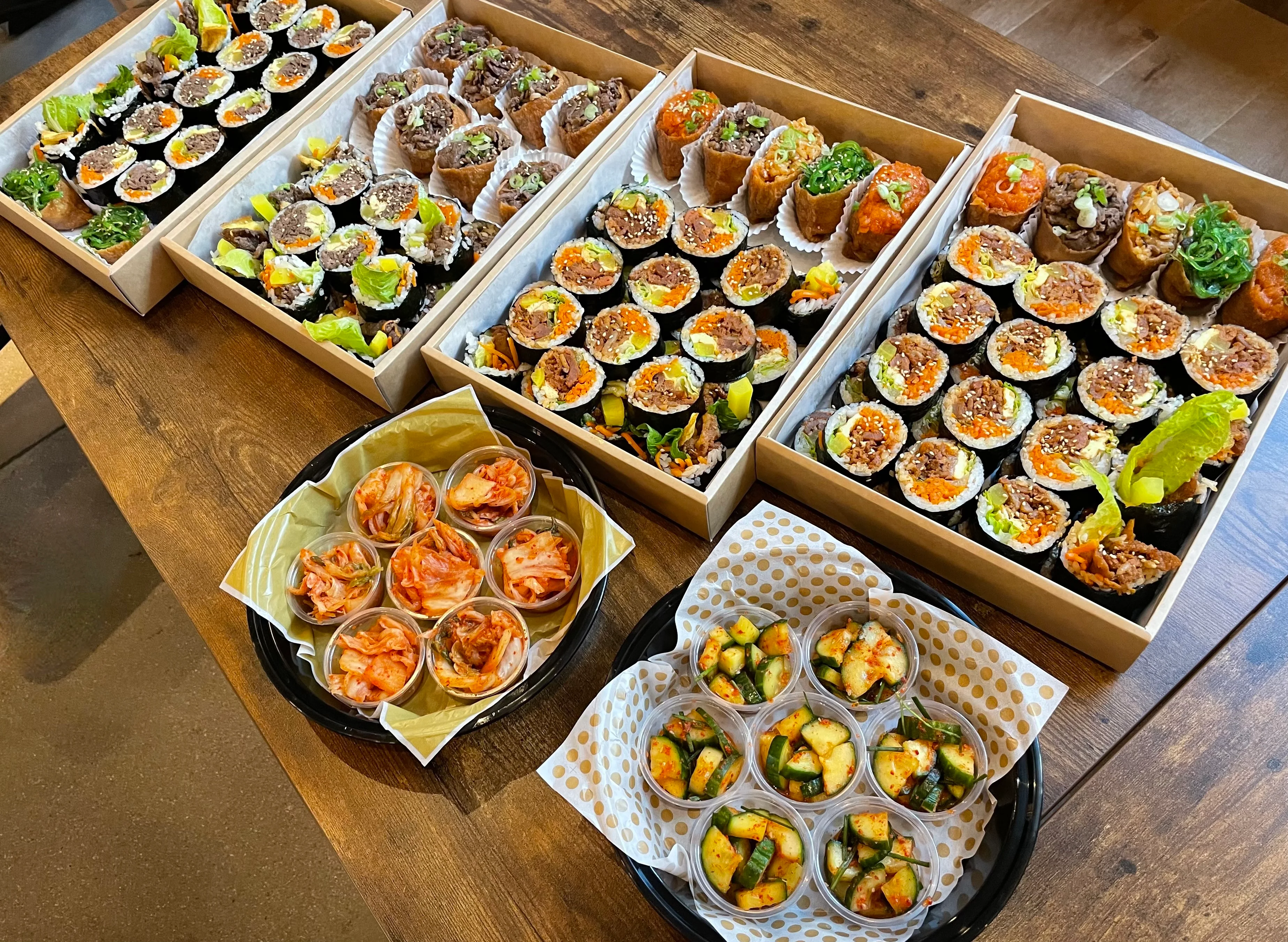 Assorted sushi rolls in a wooden box