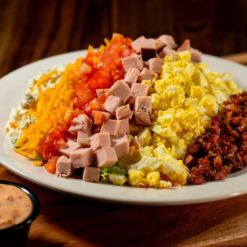 Hearty breakfast platter with scrambled eggs and diced ham