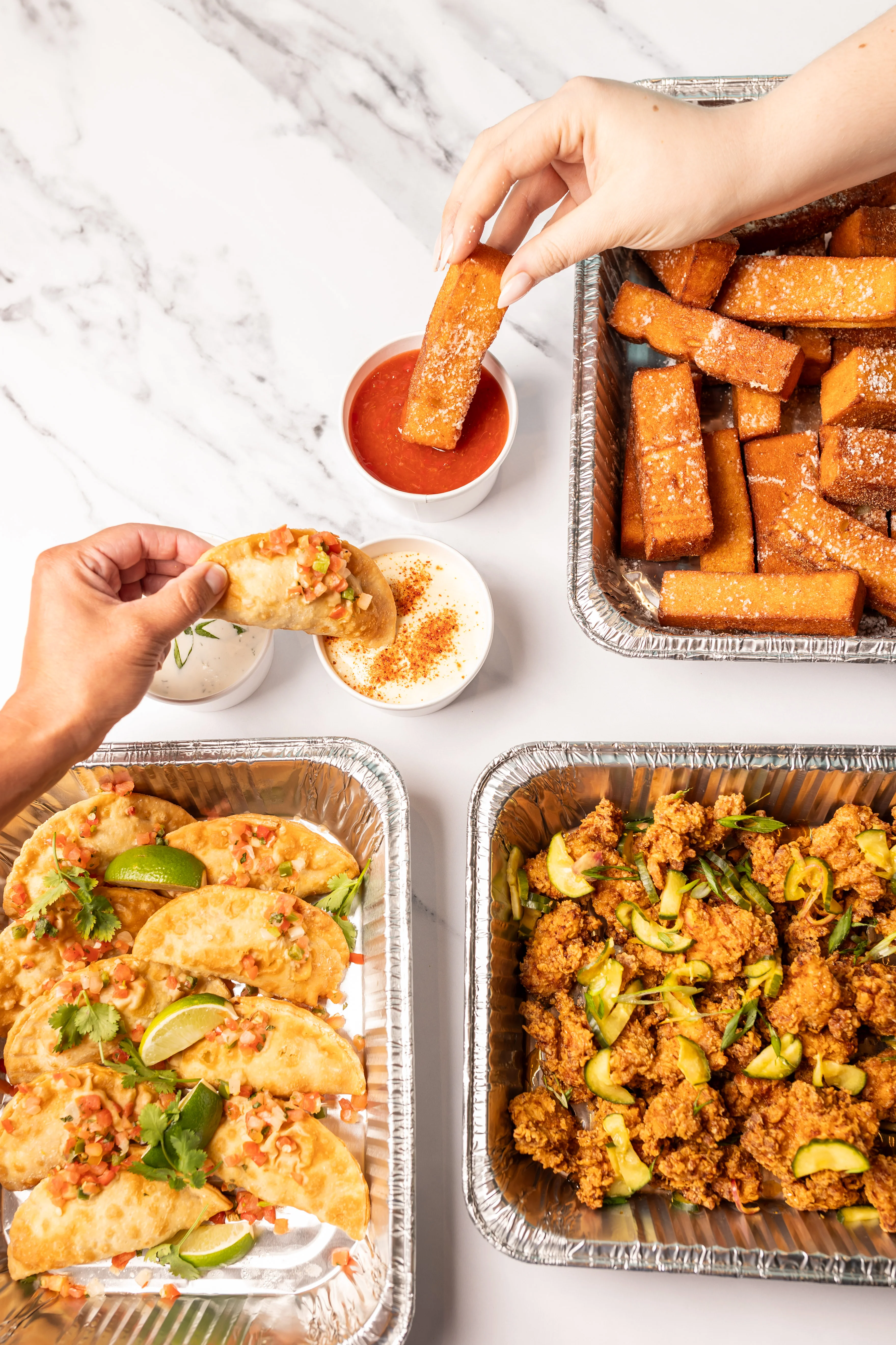 Catering options pictured with multiple menu items.