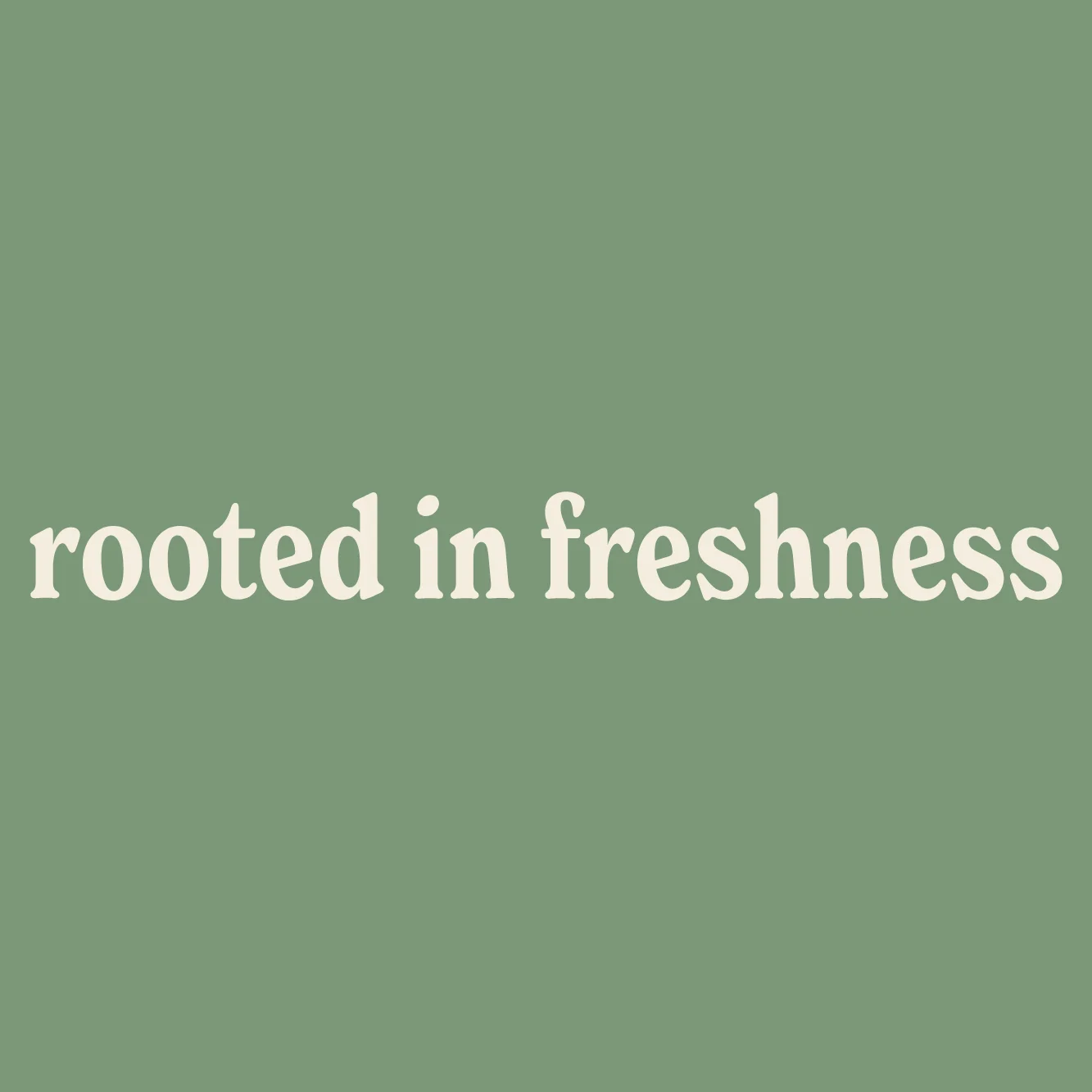 Text graphic stating 'rooted in freshness' on a green background