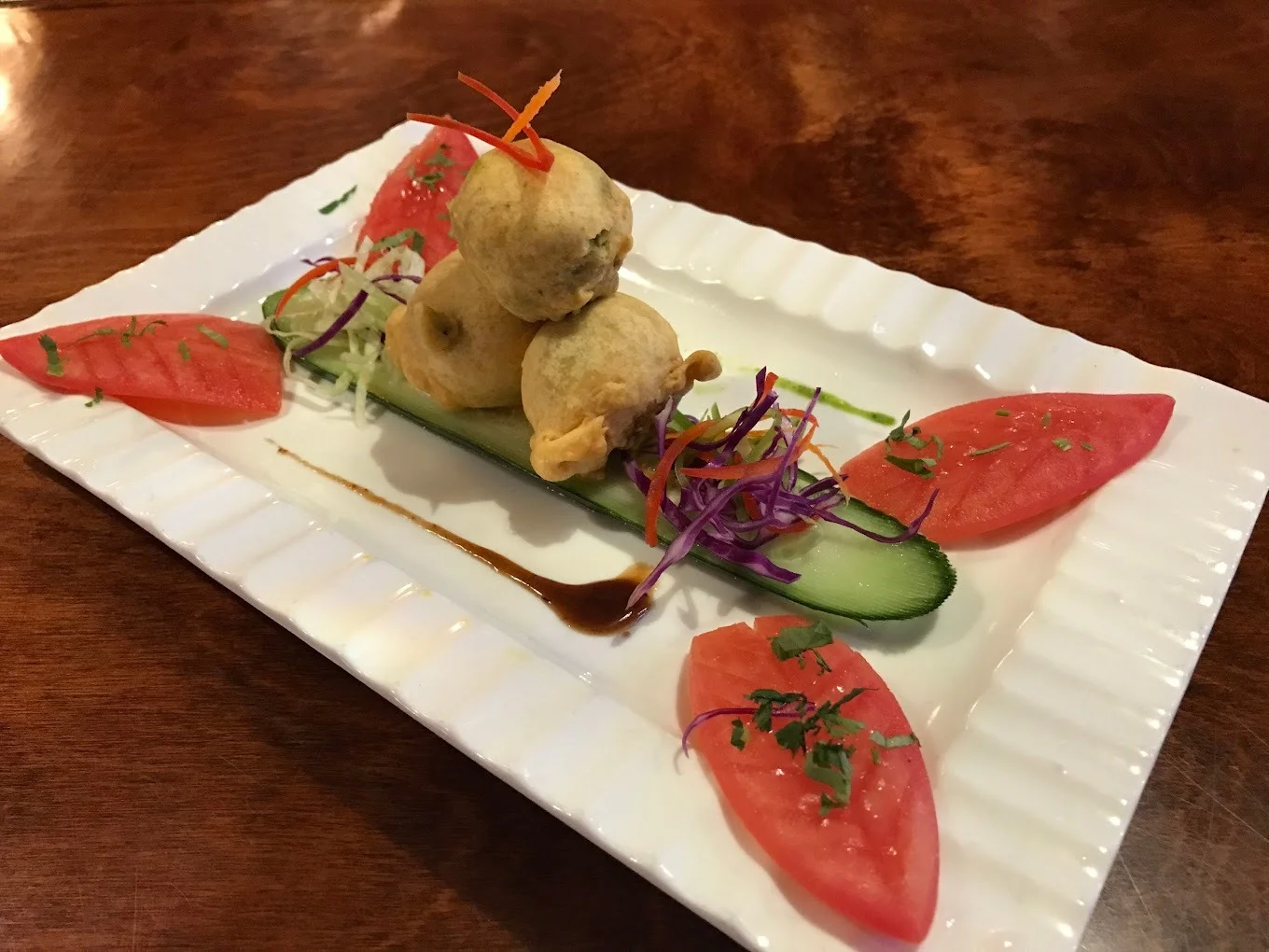 Crispy Indian bhaji served on a decorative plate