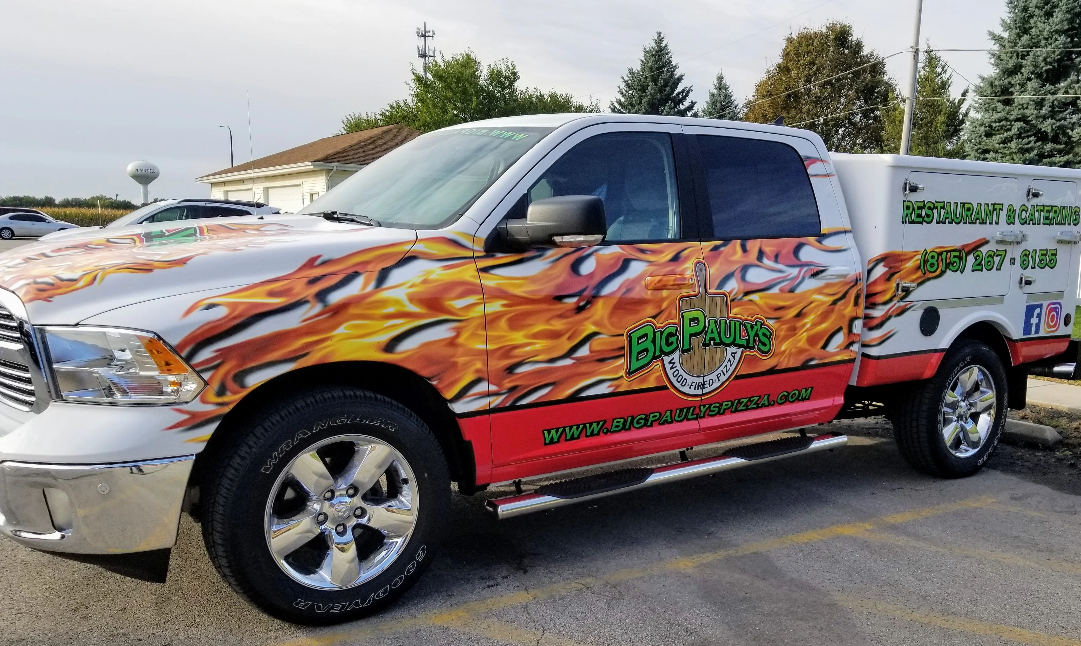 Big Pauly's food truck with vibrant flame design