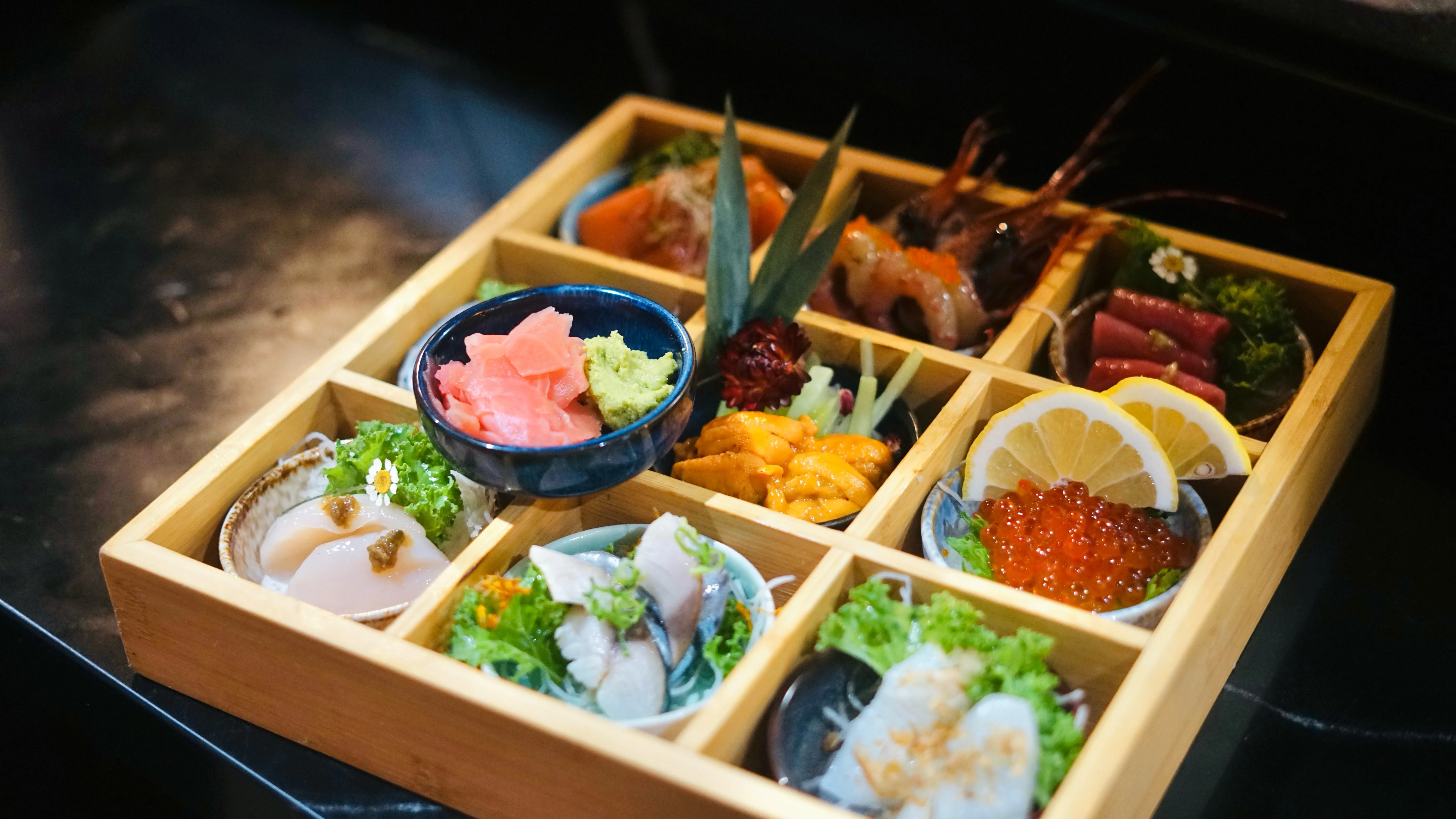 A beautifully arranged table with gourmet dishes and elegant tableware.