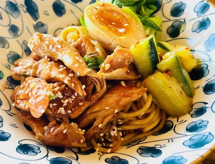 Japanese house noodle dish with chicken and soft-boiled egg