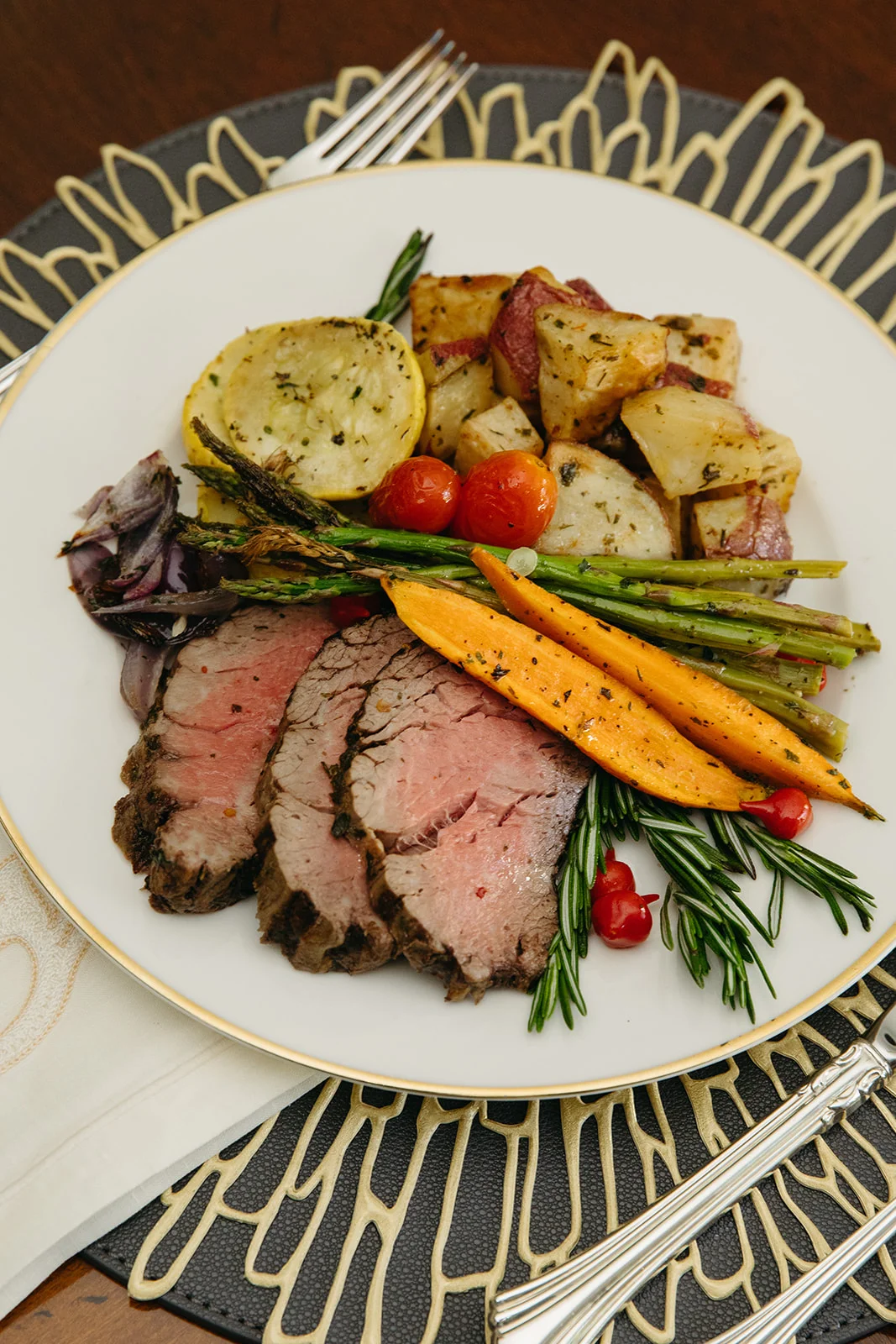 A beautifully arranged plate of food with vibrant colors and garnishes.