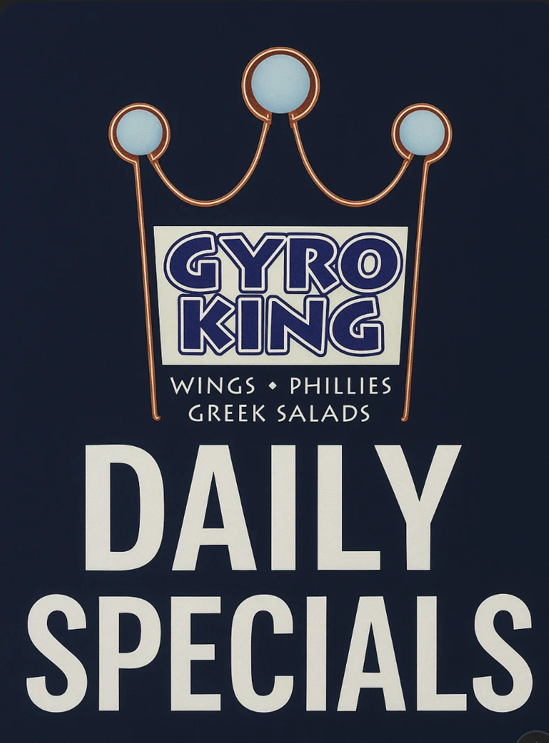 Daily specials sign for Gyro King restaurant featuring wings and Greek salads