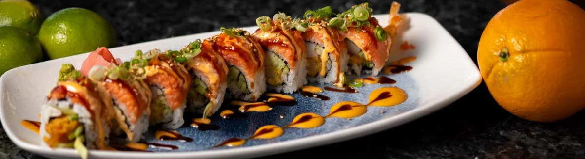 Japanese sushi roll with salmon and avocado