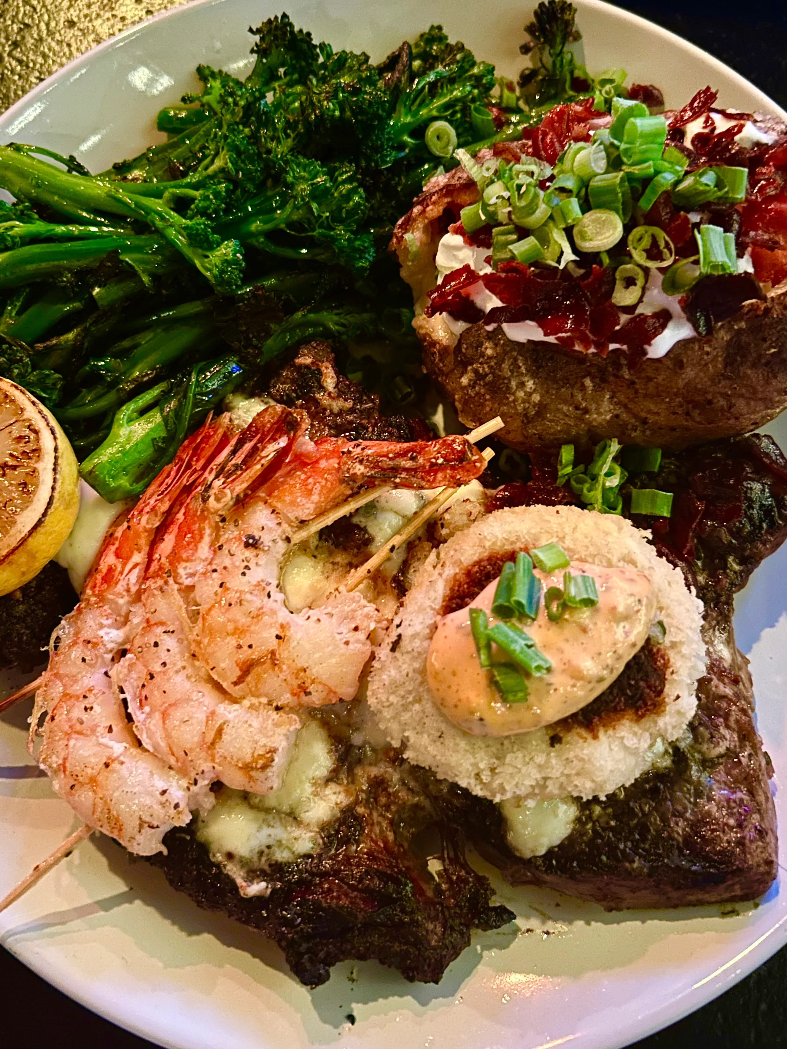 Delicious gourmet burger with fresh toppings on a wooden table