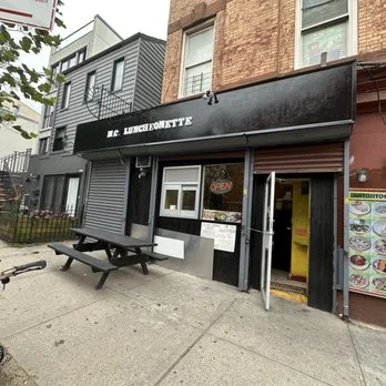 Exterior view of a cozy diner with a welcoming entrance