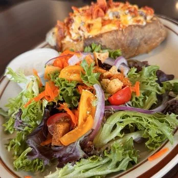 Fresh garden salad with baked potato