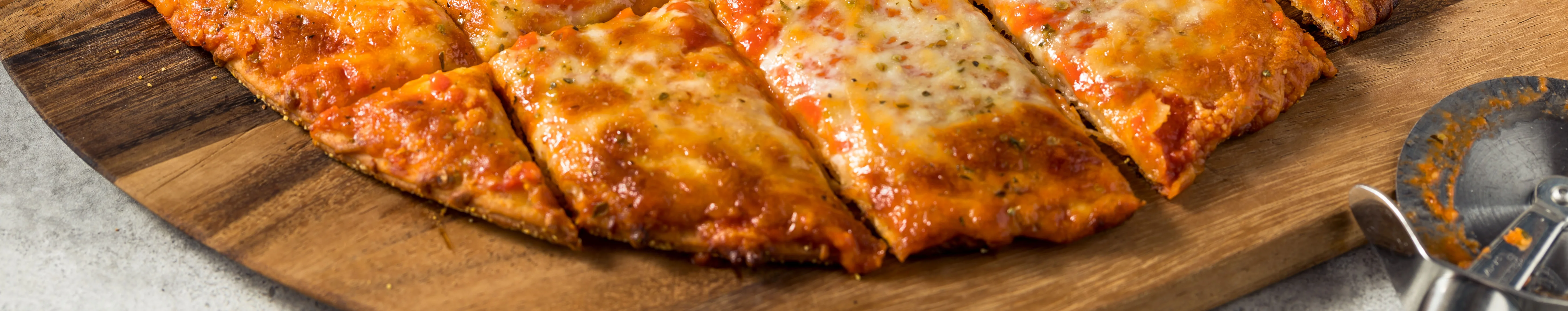 Cheesy rectangular pizza with marinara sauce