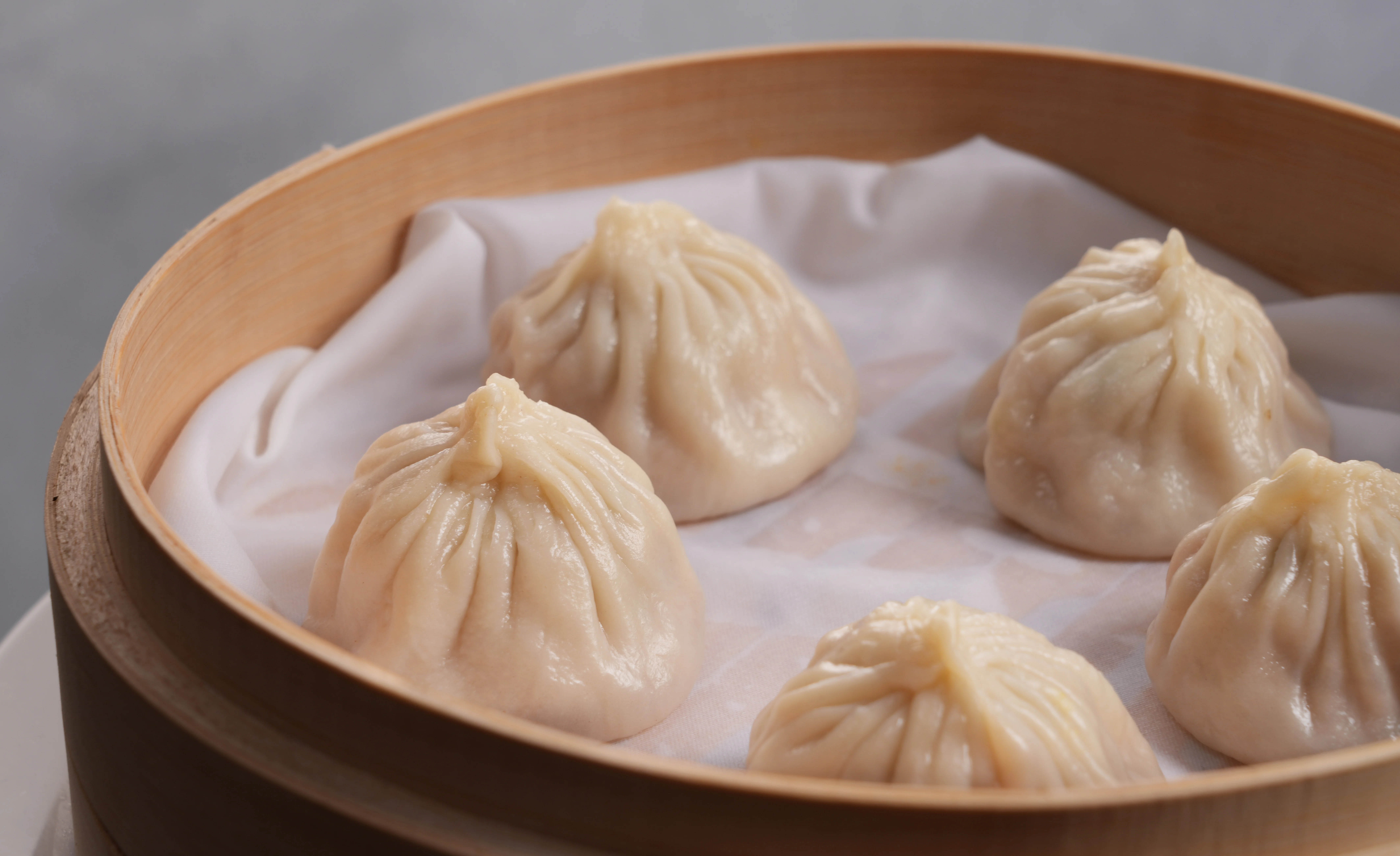 Steamed Chinese bao buns with scallions