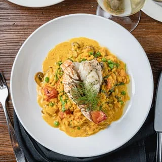 Creamy lobster risotto with fresh herbs