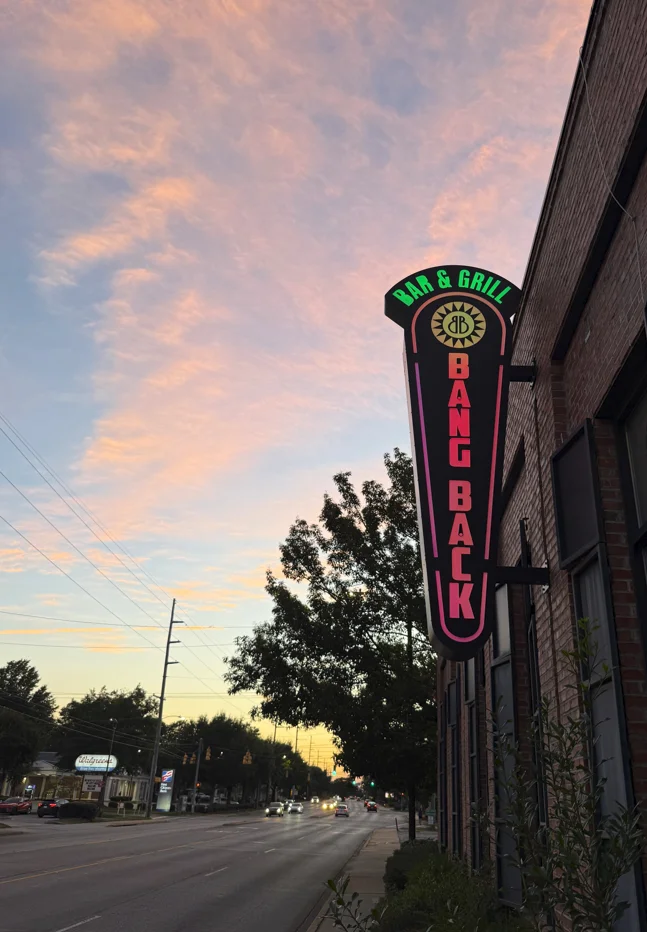 Bang Back Bar & Grill exterior sign at sunset on a city street