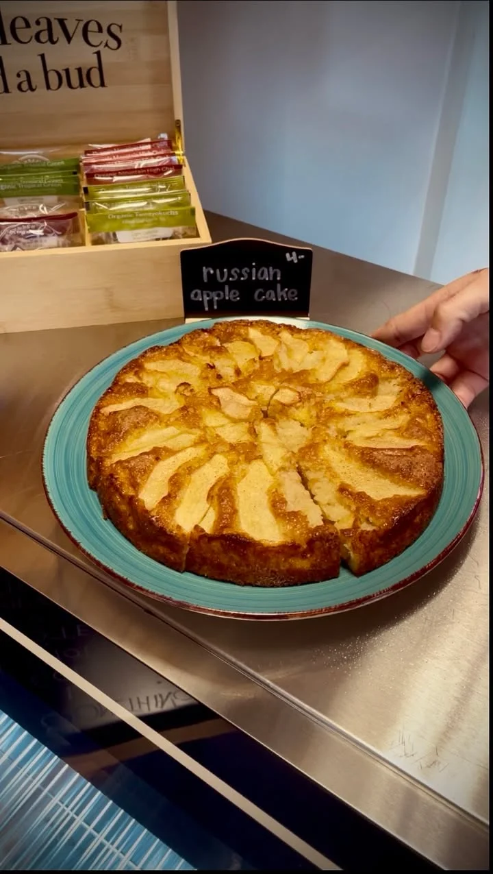 Russian apple cake on a turquoise plate