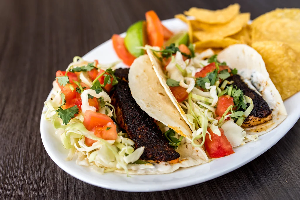 Delicious fish tacos served with fresh toppings