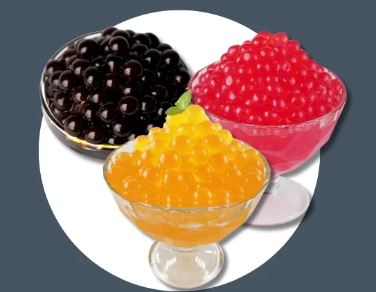 Colorful boba pearls in three flavors served in glass bowls