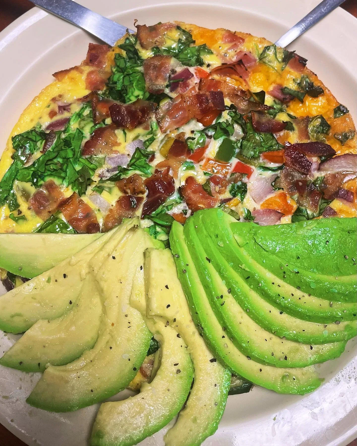 Hearty breakfast frittata with avocado slices
