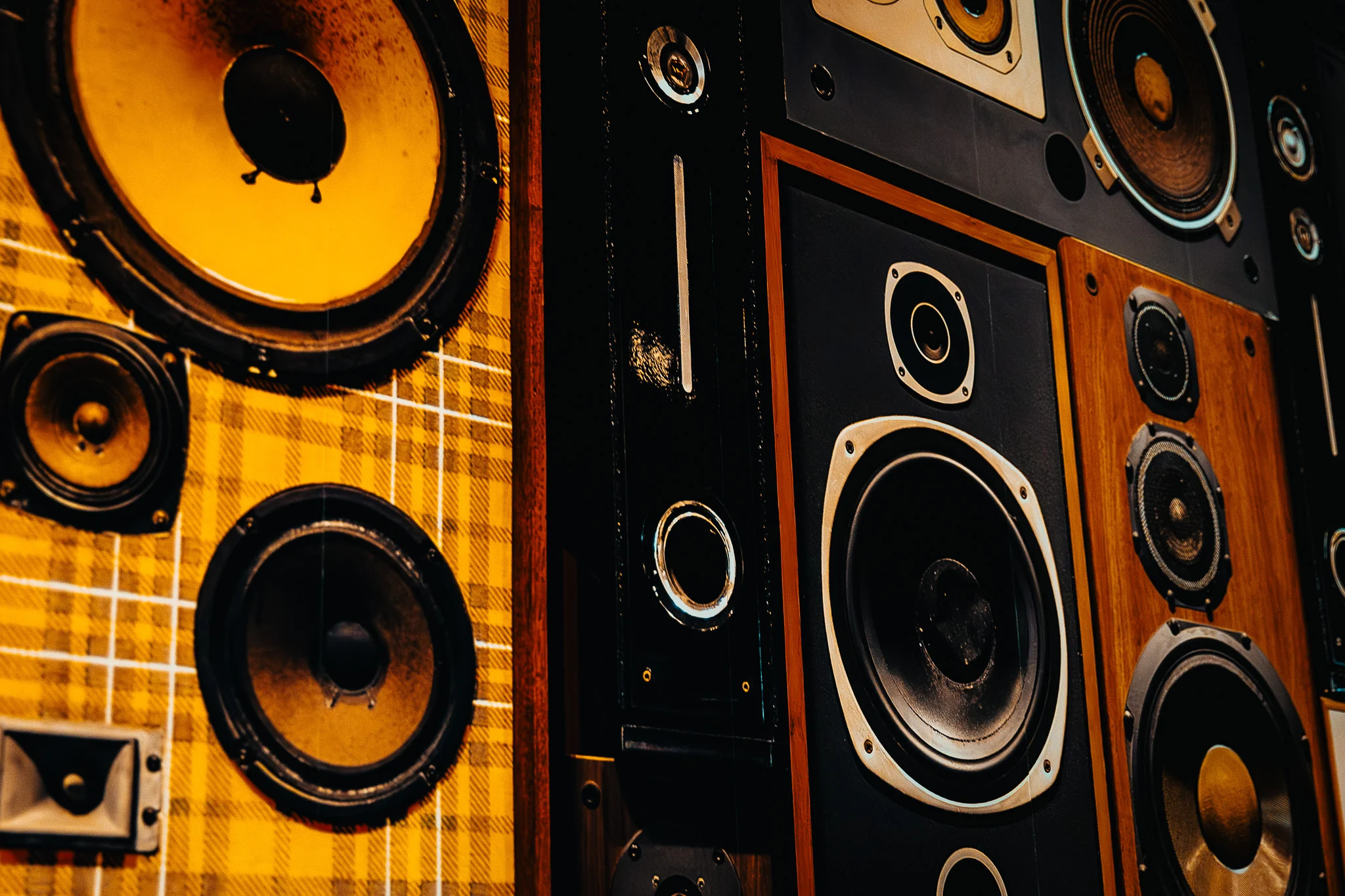 Wall of vintage speakers in a retro style