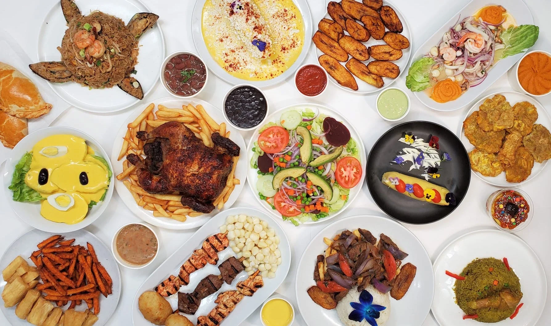 Assorted Latin American dishes on a vibrant table setting