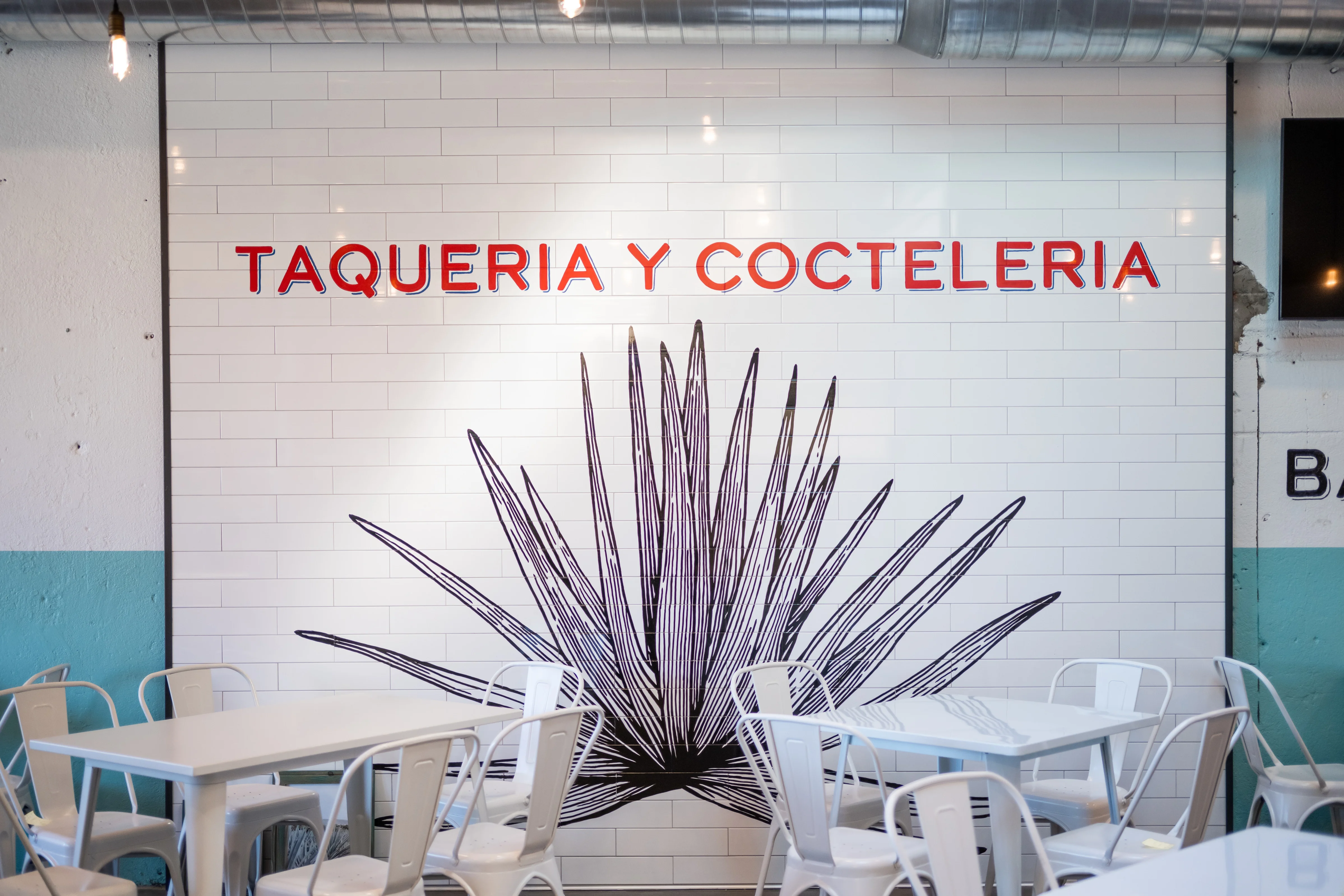 Modern taqueria interior with vibrant decor