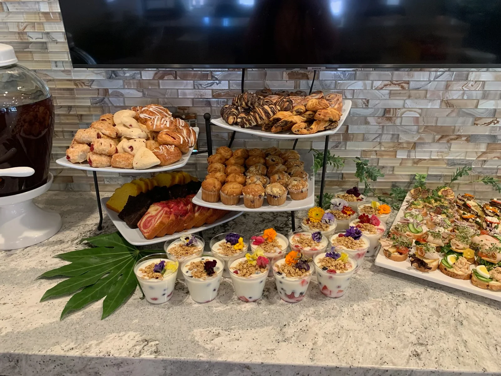 Assorted pastries and desserts on a buffet table