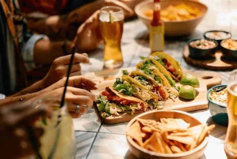 Colorful platter of Mexican tacos with fresh toppings