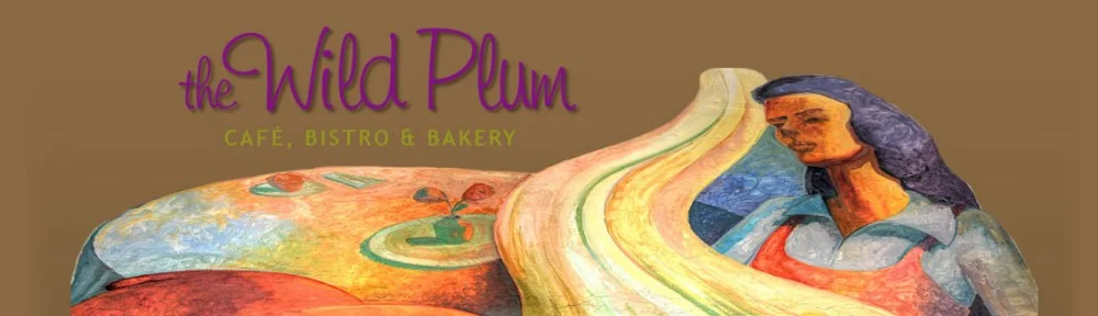 Artistic logo of The Wild Plum Café, Bistro & Bakery