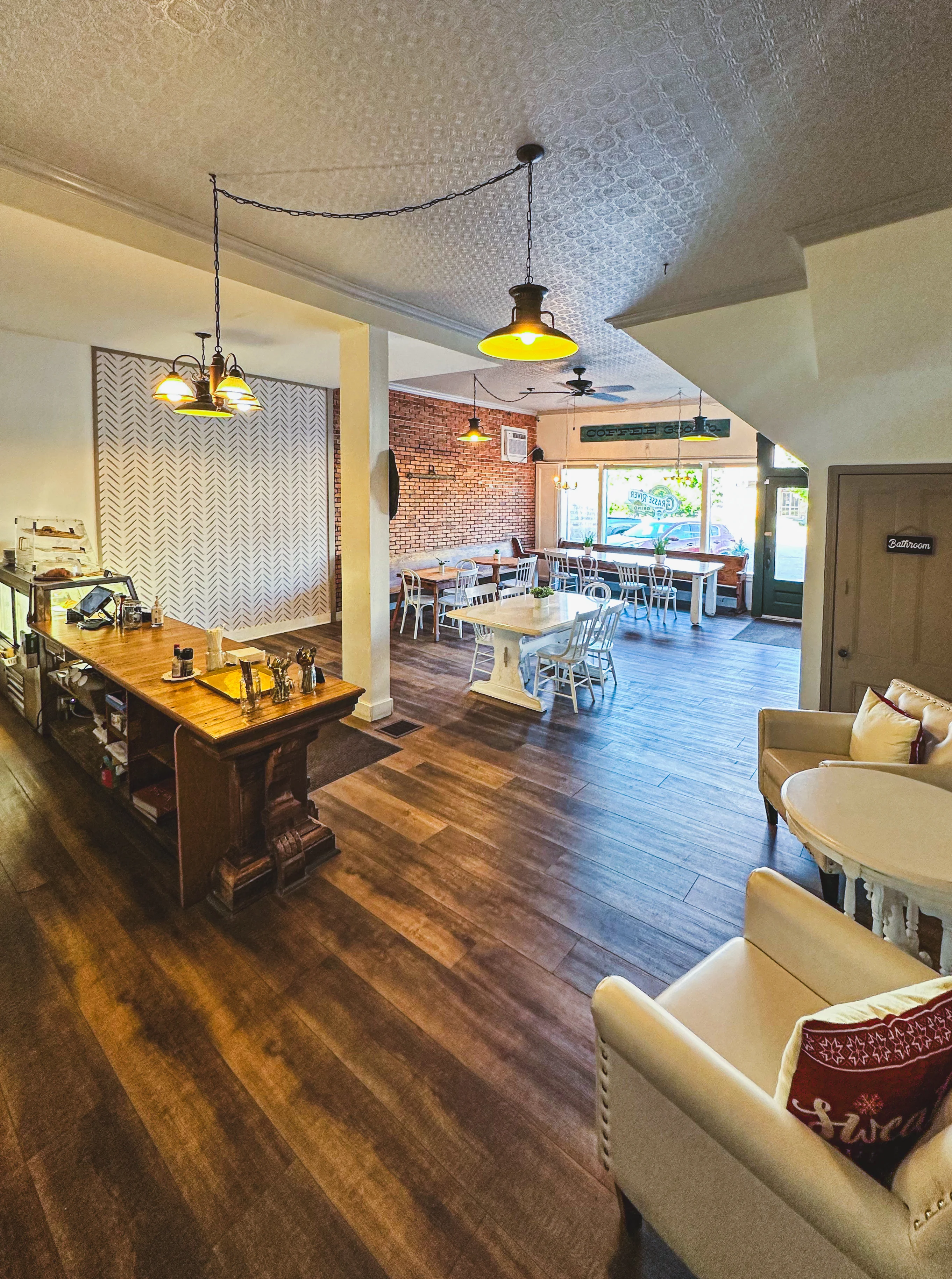 Cozy restaurant interior with warm lighting and rustic decor