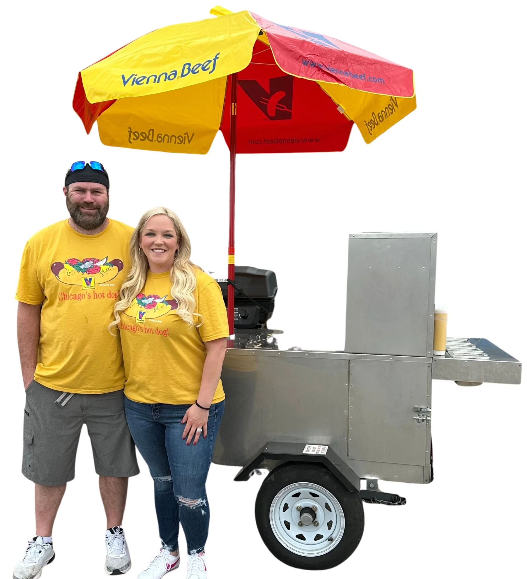 Couple with hot dog cart featuring Chicago-style hot dogs