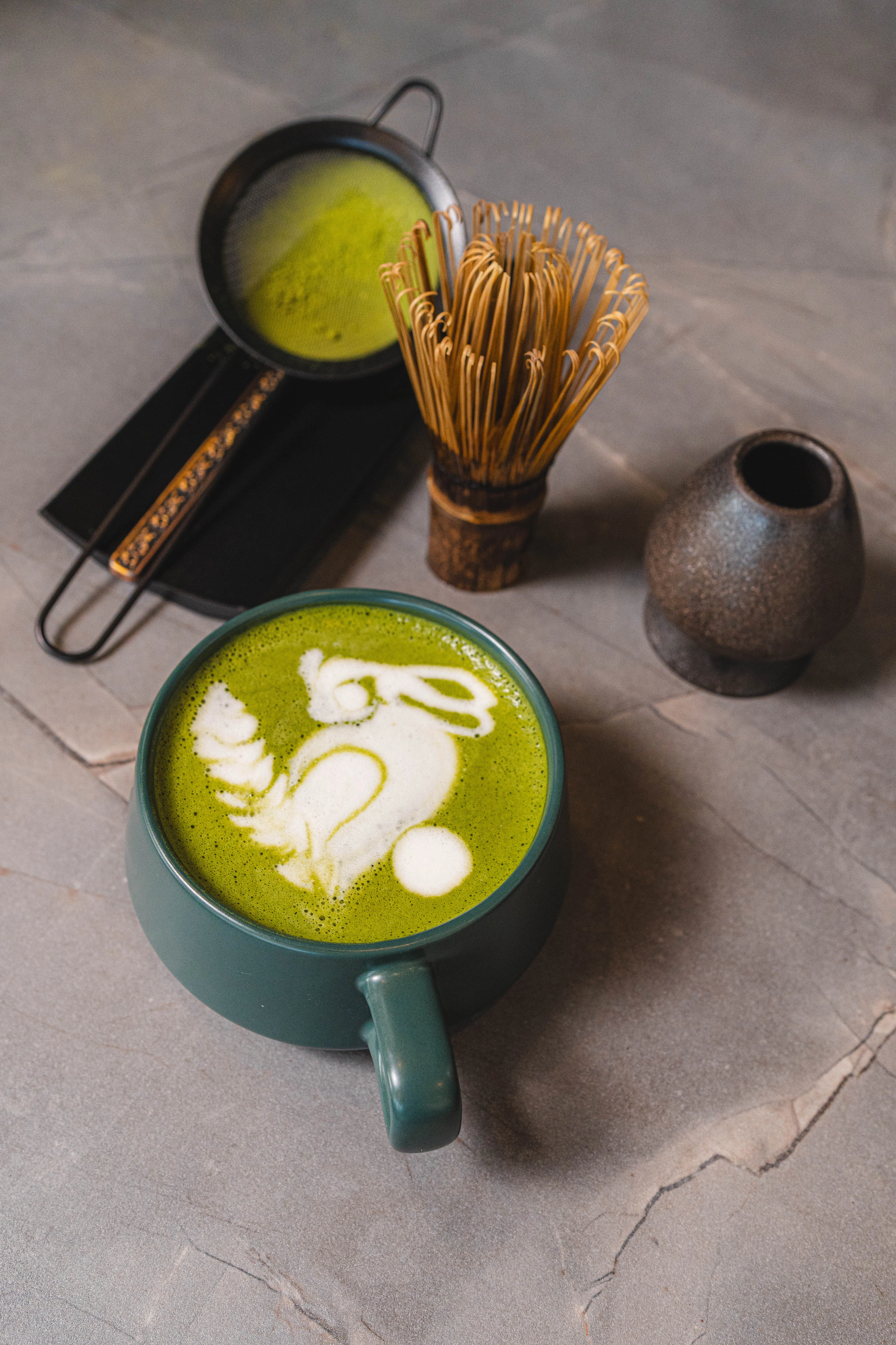 Japanese matcha latte with artistic foam design