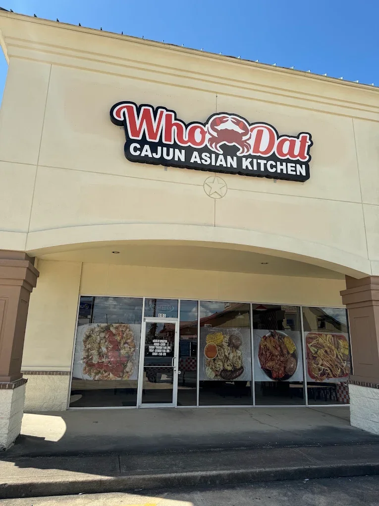 Who Dat Cajun Asian Kitchen restaurant storefront with food window displays