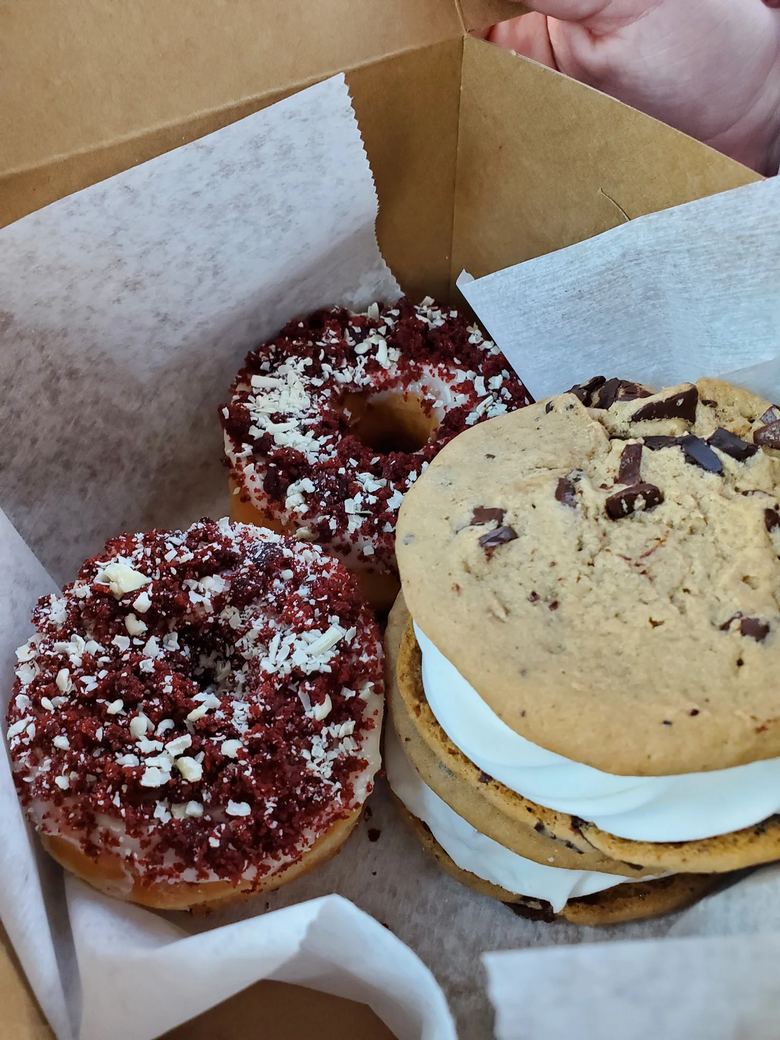 Decadent red velvet donuts and ice cream sandwiches