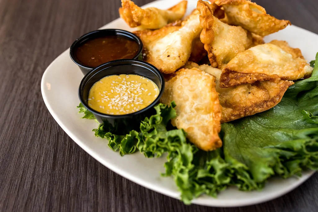 Crispy Chinese dumplings with dipping sauces