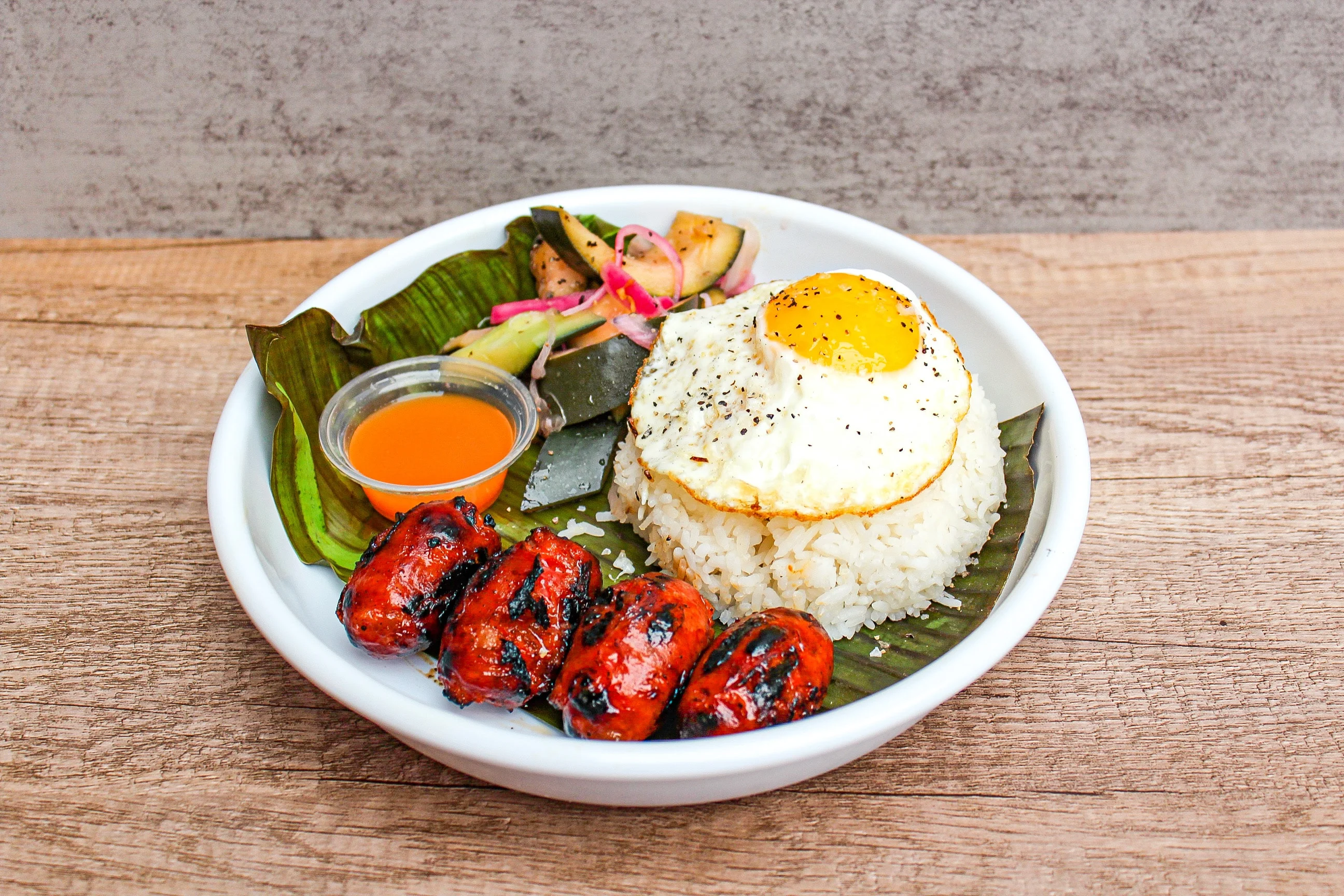 Filipino longganisa with garlic rice and fried egg