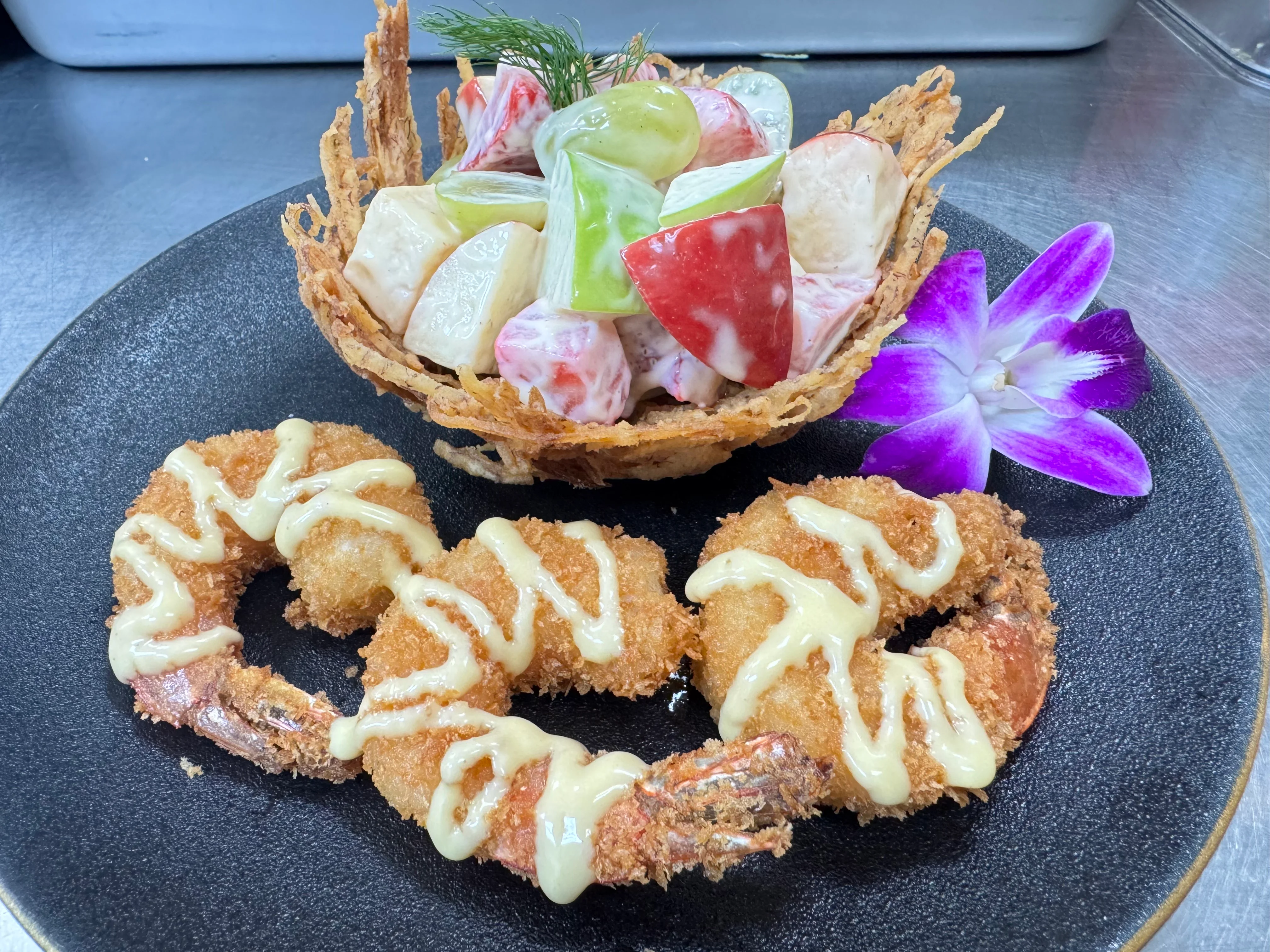 Crispy shrimp tempura with fruit salad
