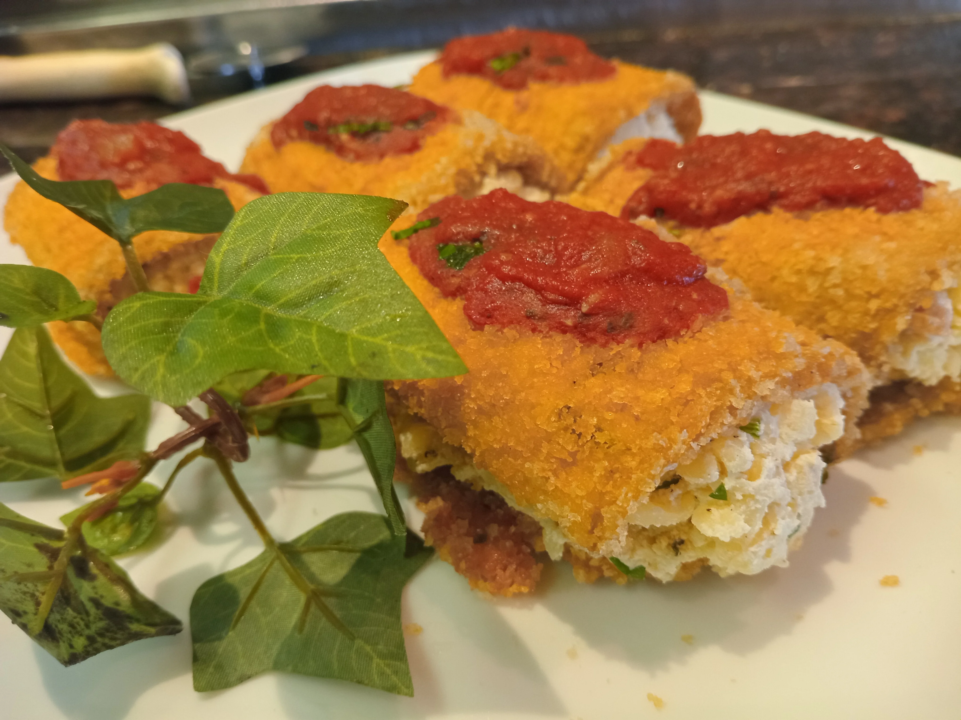 Crispy Argentinean milanesa with tomato sauce