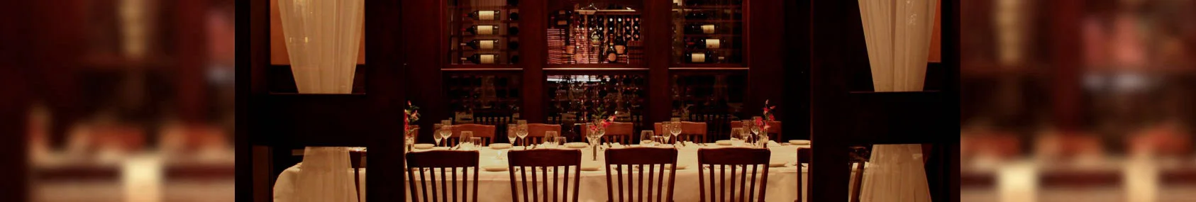 Elegant restaurant interior with wooden wine display