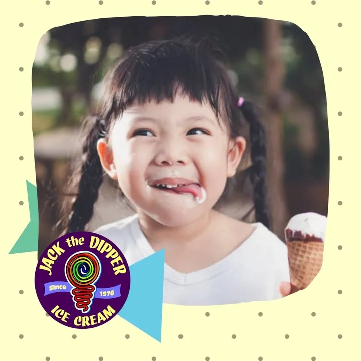 Child enjoying ice cream cone with a joyful expression