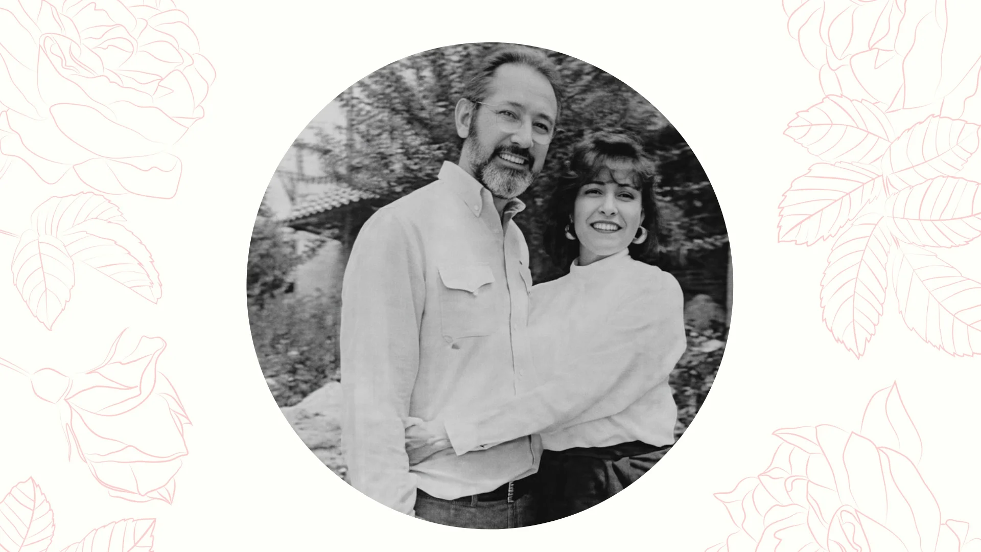 Couple smiling together in a garden setting