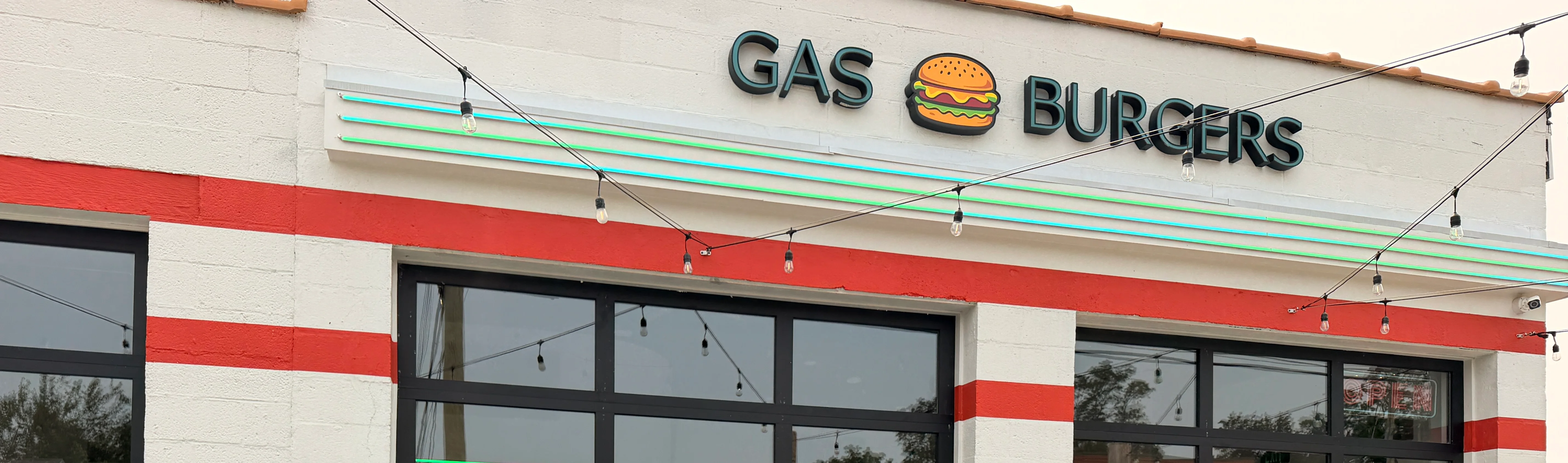 Exterior of Gas Burgers restaurant with neon signage