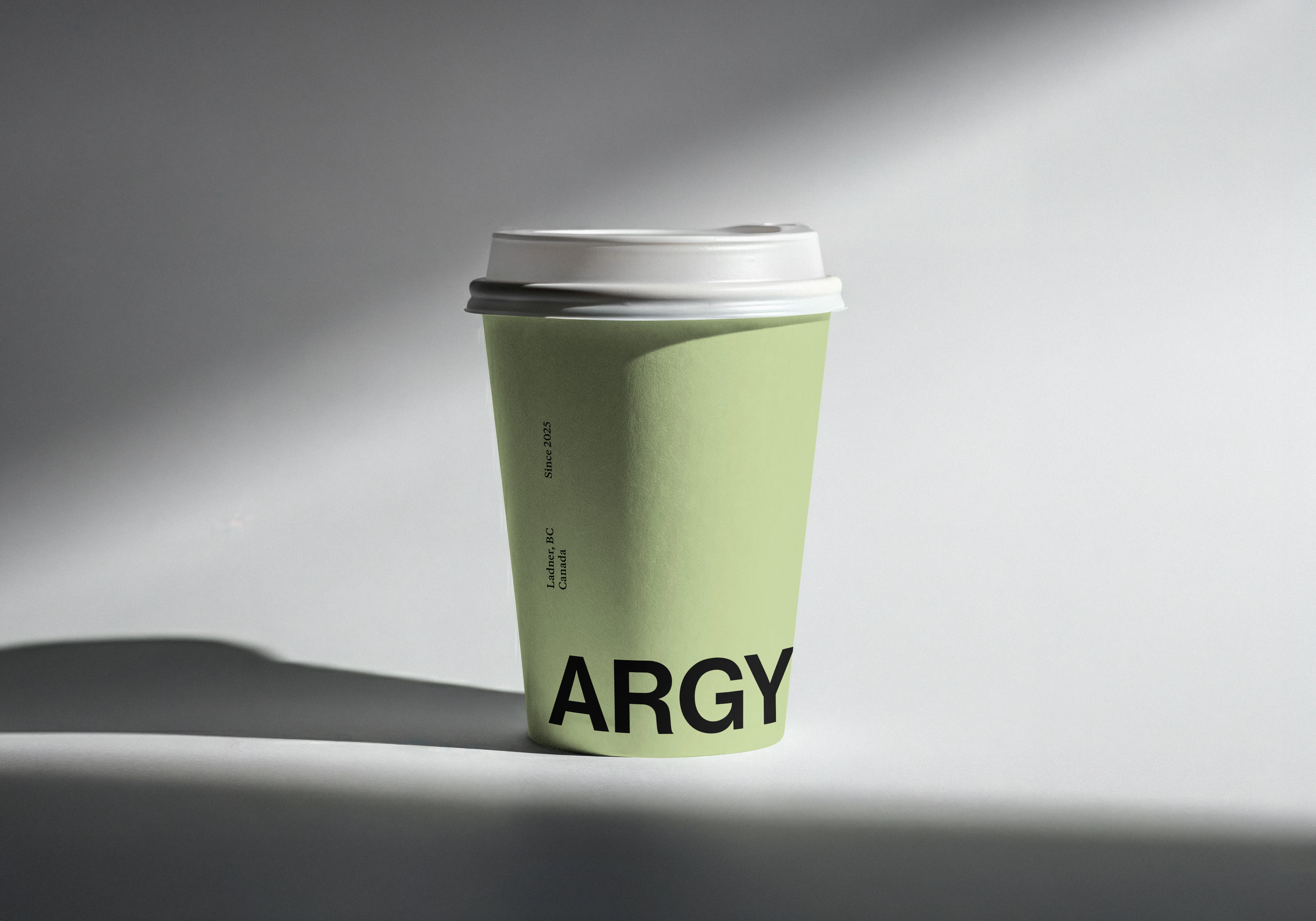 Abstract green restaurant branding graphic with bold black typography