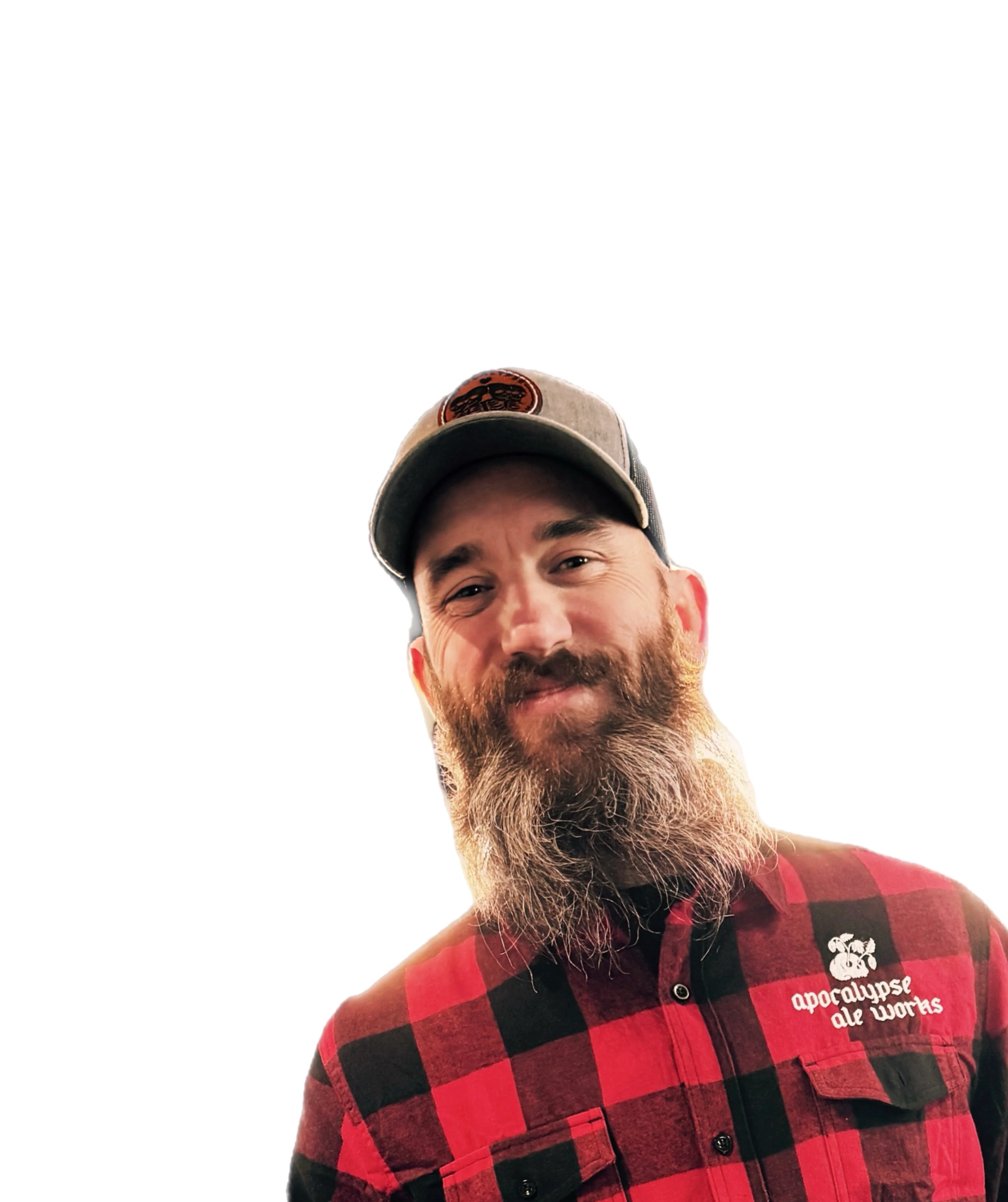 Smiling bartender in a plaid shirt at a craft brewery